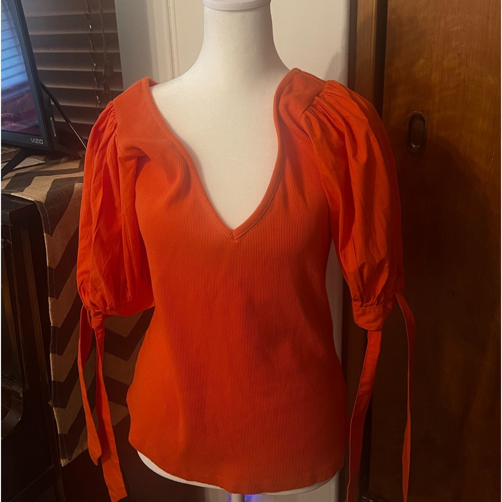 Orange color puff sleeve top from Maeve by Anthropologie